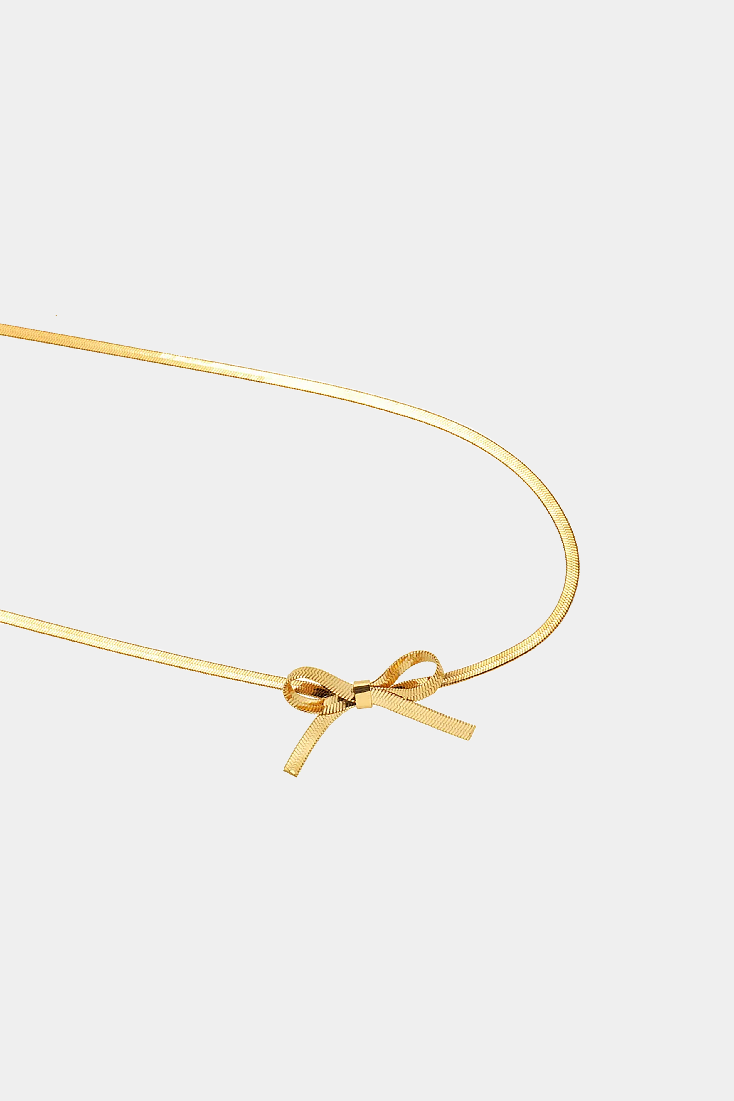 Tiny Bow Choker in Gold