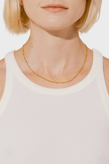 Layering Ball-Station Chain in Gold
