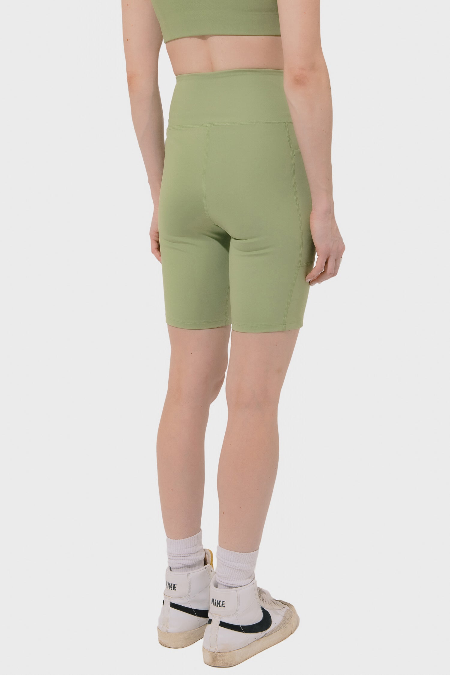 Women's Girlfriend Collective High Rise Pocket Bike Short in Mantis