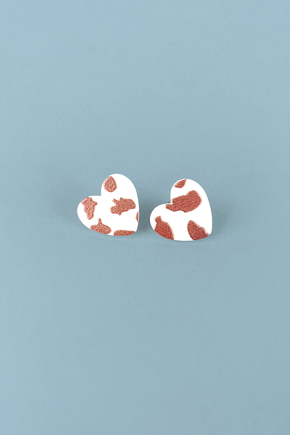 Printed Heart Studs in Brown Cow